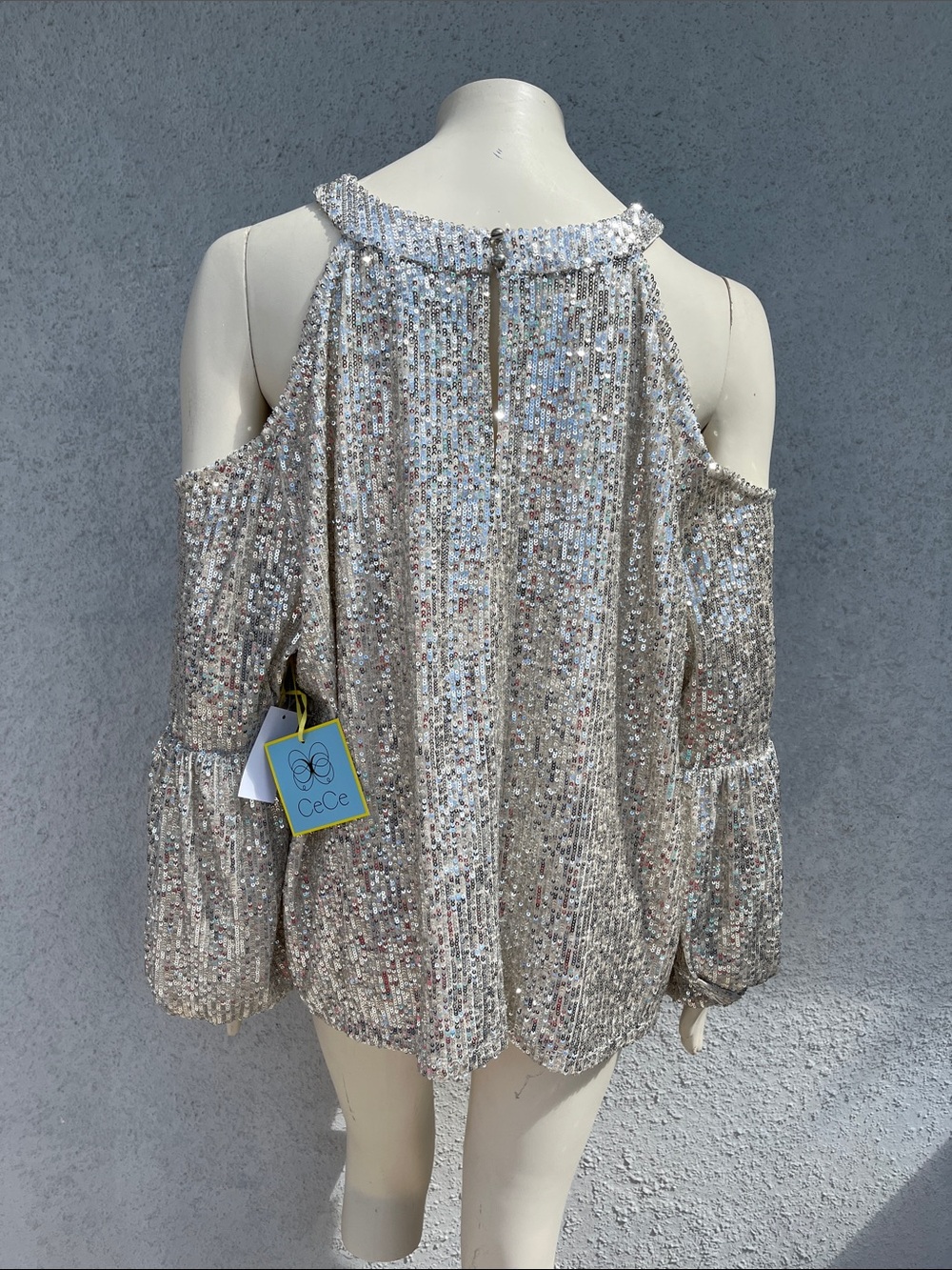 CeCe Silver Sequin Cold-Shoulder Top